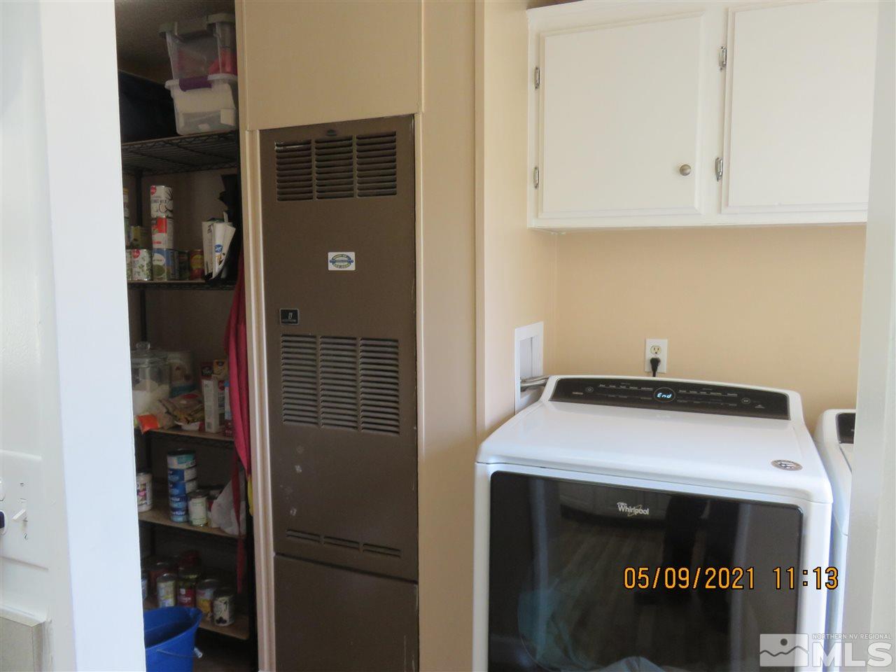 17525 Fantail Street Reno, NV 89508 - Photo 9 of 13 a utility room with dryer and washer
