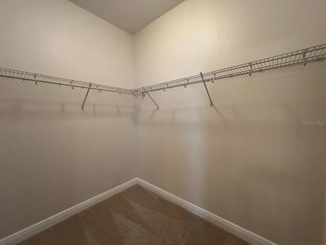 a view of small space with racks on the wall