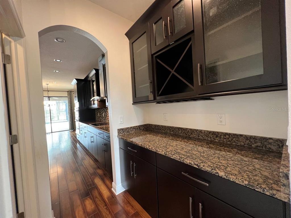 1692 Nature View Drive Lutz, FL 33558 - Photo 6 of 53 a kitchen with a stove and a microwave