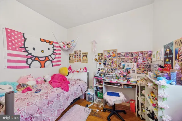 a bedroom with toys and a bed
