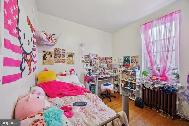 a bed room with a bed and a bed