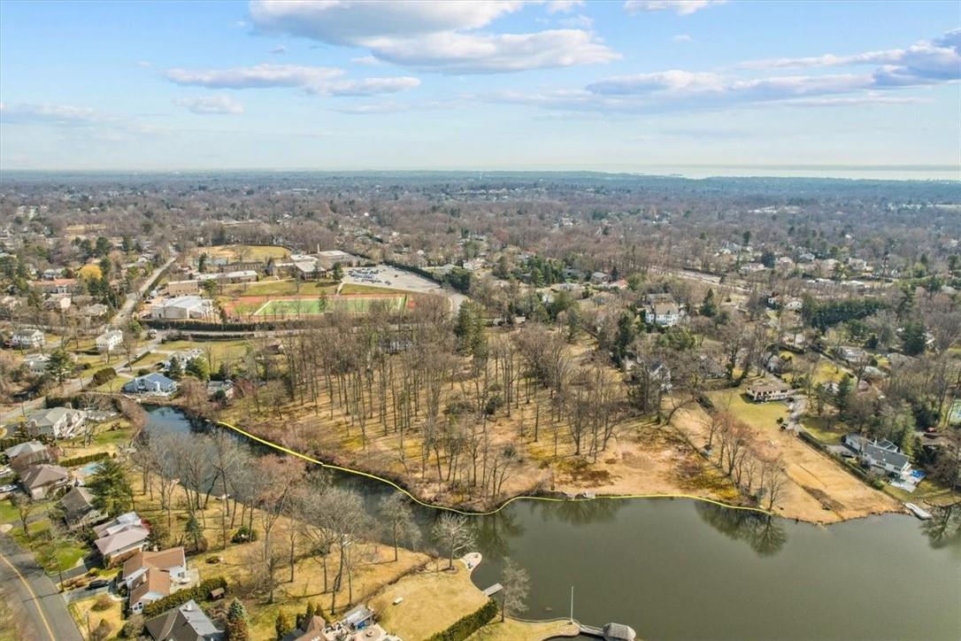 234-250 Wilmot Road New Rochelle, NY 10804 - Photo 1 of 1 an aerial view of residential building with ocean view
