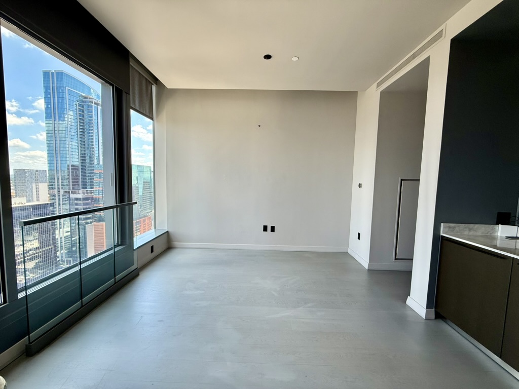 210 Lavaca Street, Unit 2809 Austin, TX 78701 - Photo 4 of 17 Living room opposite the kitchen