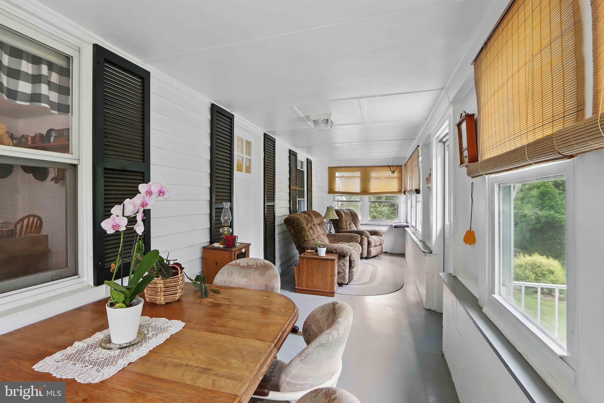 147 Darlington Road Havre de Grace, MD 21078 - Photo 17 of 52 a living room with furniture fireplace and large windows