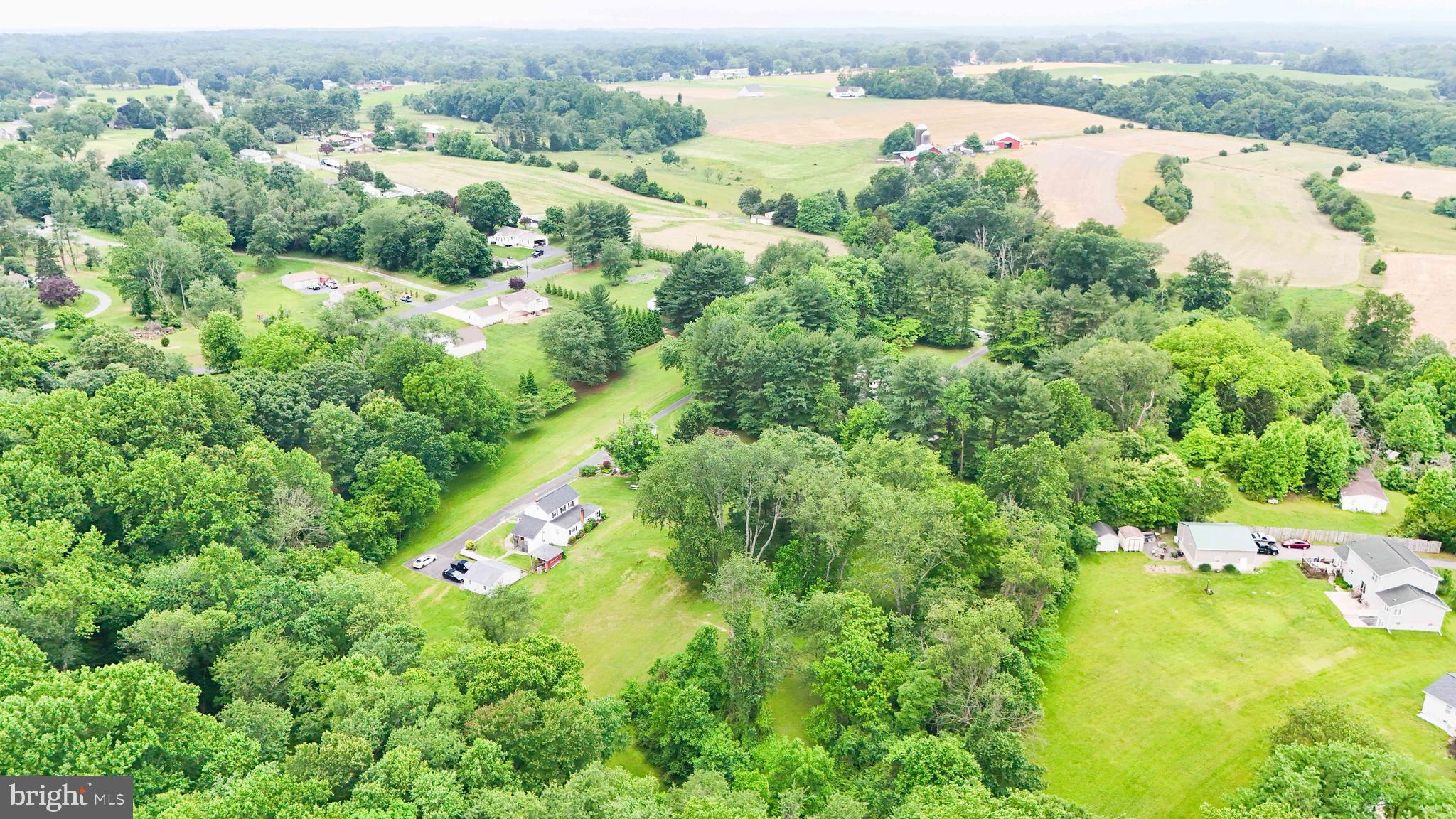 147 Darlington Road Havre de Grace, MD 21078 - Photo 2 of 52 an aerial view of green landscape with trees houses and lake view