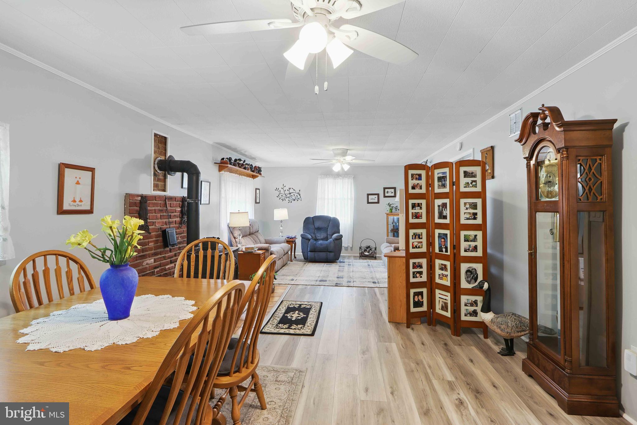 147 Darlington Road Havre de Grace, MD 21078 - Photo 21 of 52 a living room with furniture a chandelier and a bookshelf