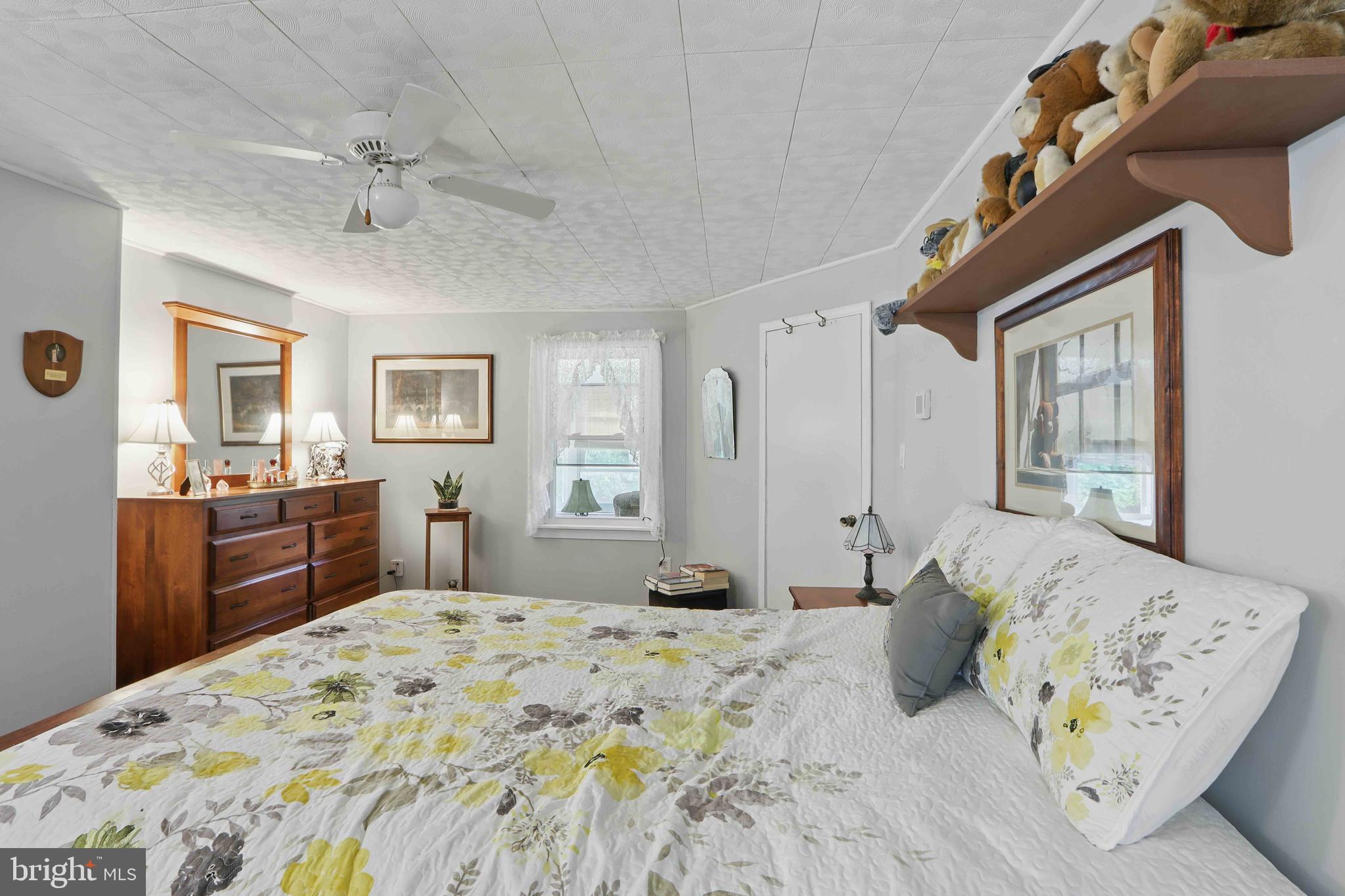 147 Darlington Road Havre de Grace, MD 21078 - Photo 29 of 52 a bedroom with a large bed and a dresser