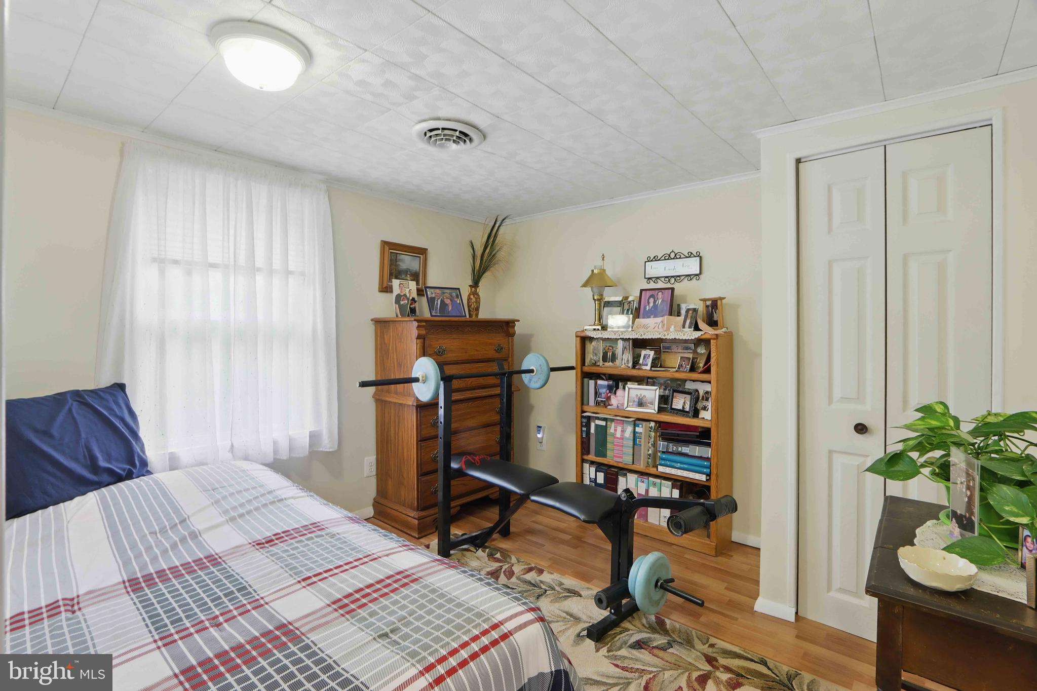 147 Darlington Road Havre de Grace, MD 21078 - Photo 43 of 52 a bed room with a bed and a book shelf