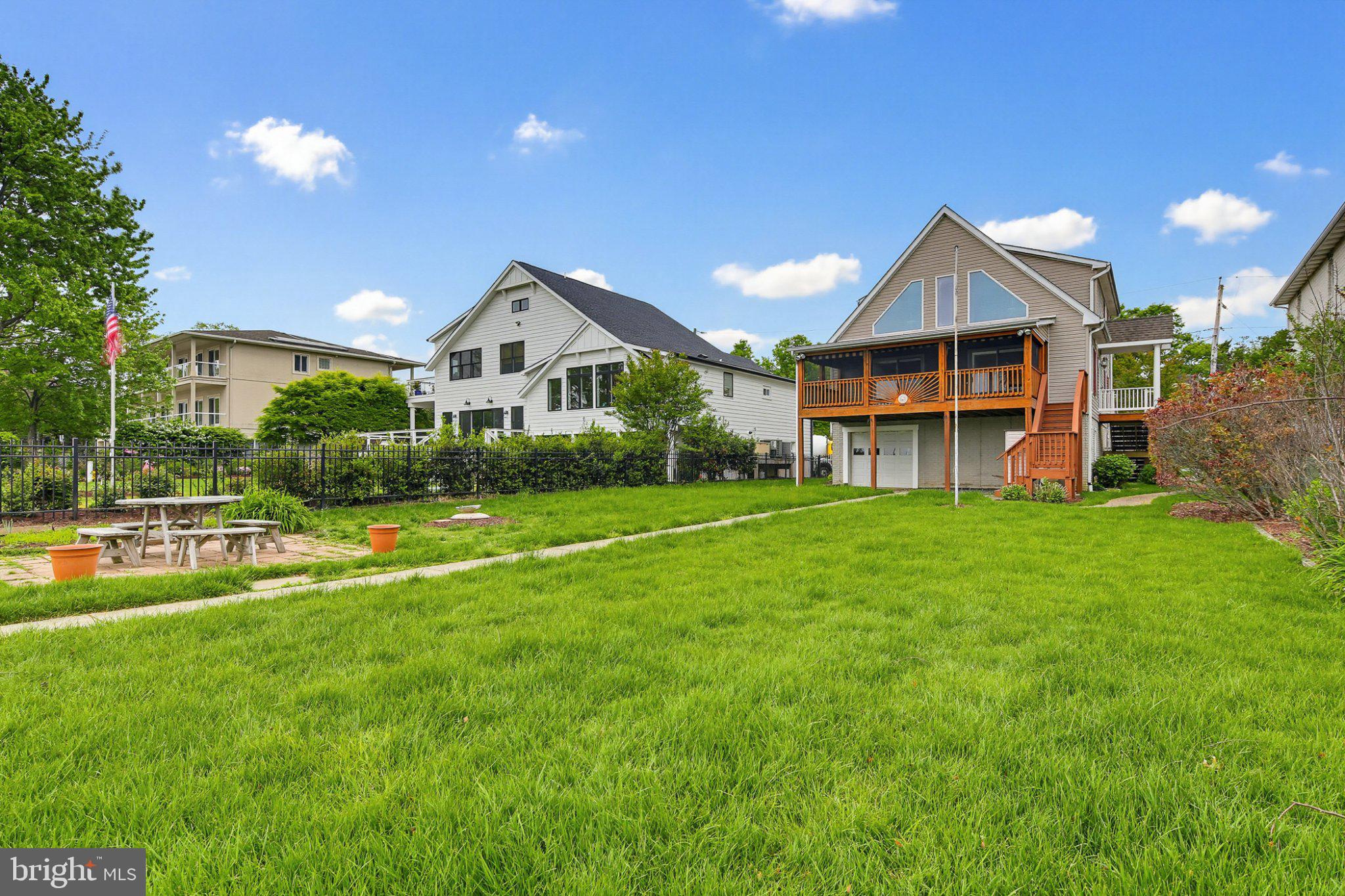 3641 Branhum Road Edgewater, MD 21037 - Photo 13 of 63 Charming homes with lush green lawns.