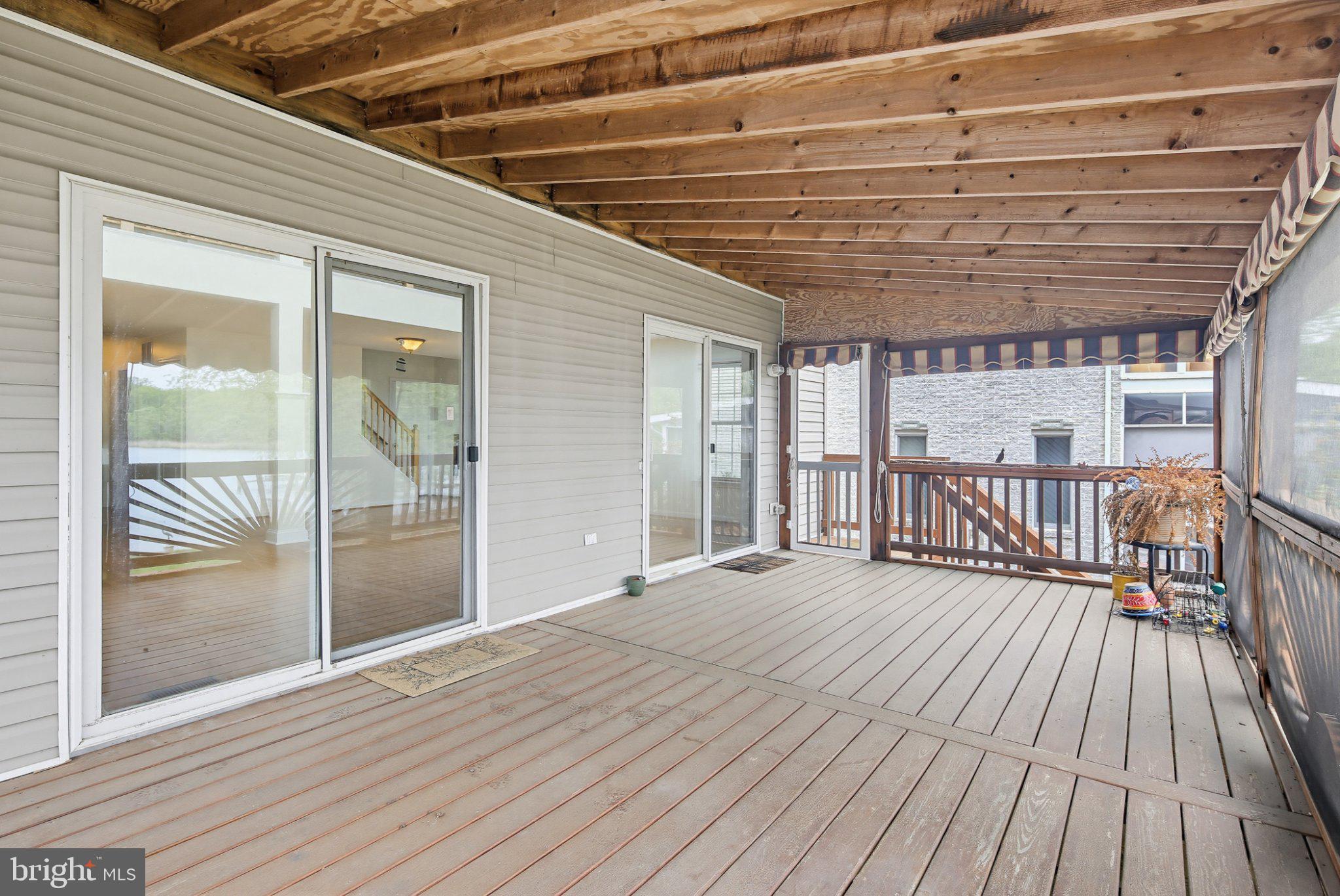 3641 Branhum Road Edgewater, MD 21037 - Photo 22 of 63 Spacious covered deck with serene views.