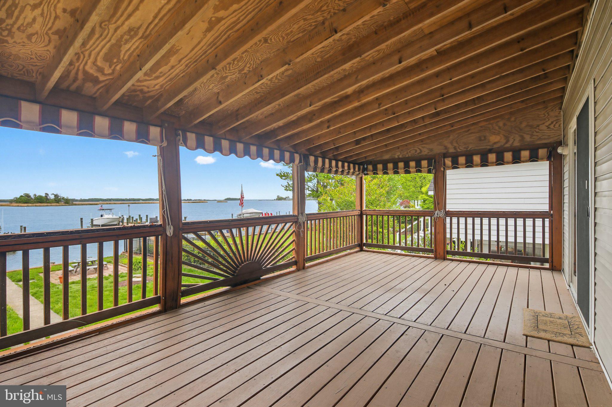 3641 Branhum Road Edgewater, MD 21037 - Photo 23 of 63 Scenic waterfront deck with serene views.