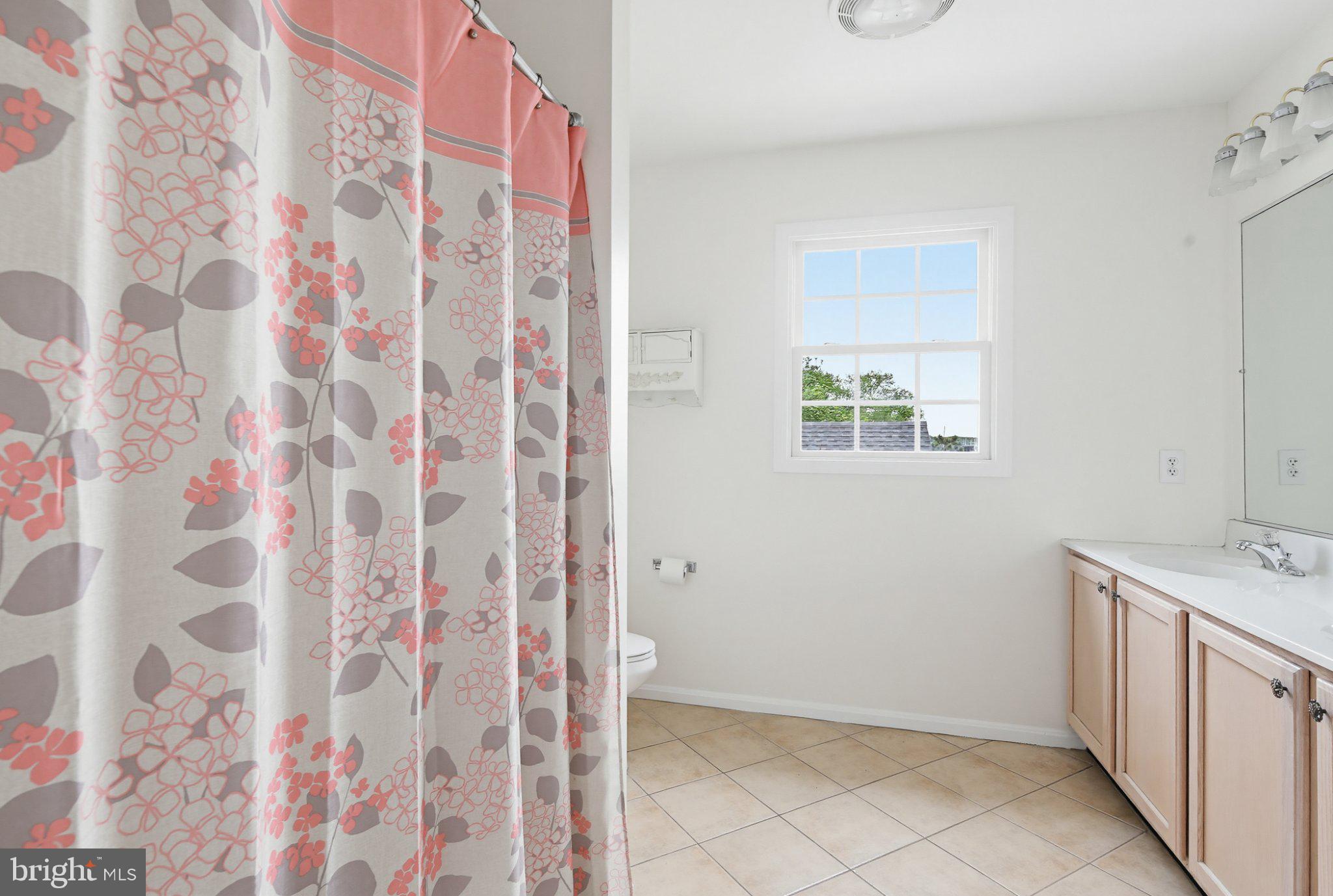 3641 Branhum Road Edgewater, MD 21037 - Photo 24 of 63 Bright and airy bathroom retreat.