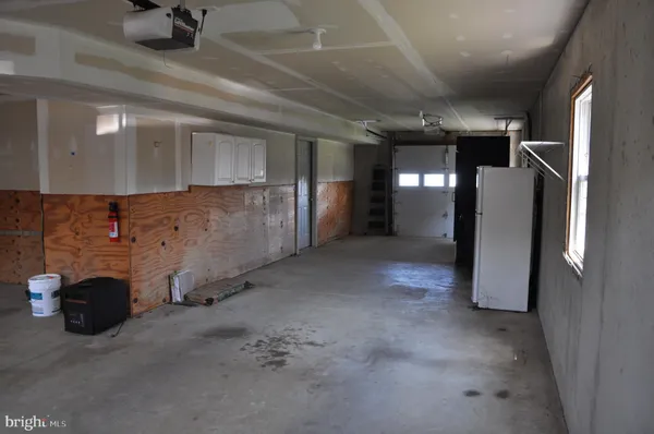 a view of a porch with wooden floor of the house