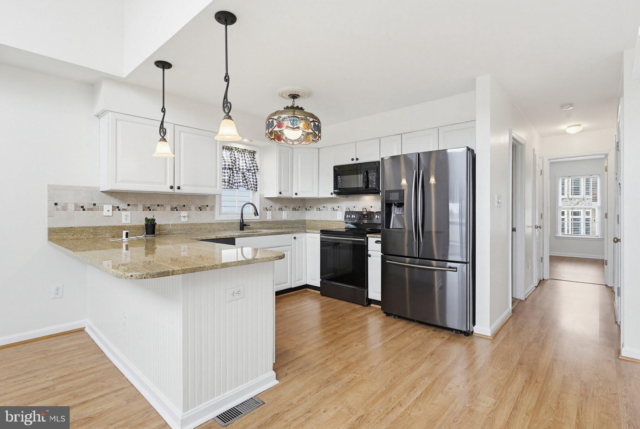 3641 Branhum Road Edgewater, MD 21037 - Photo 62 of 63 Modern kitchen with sleek finishes.