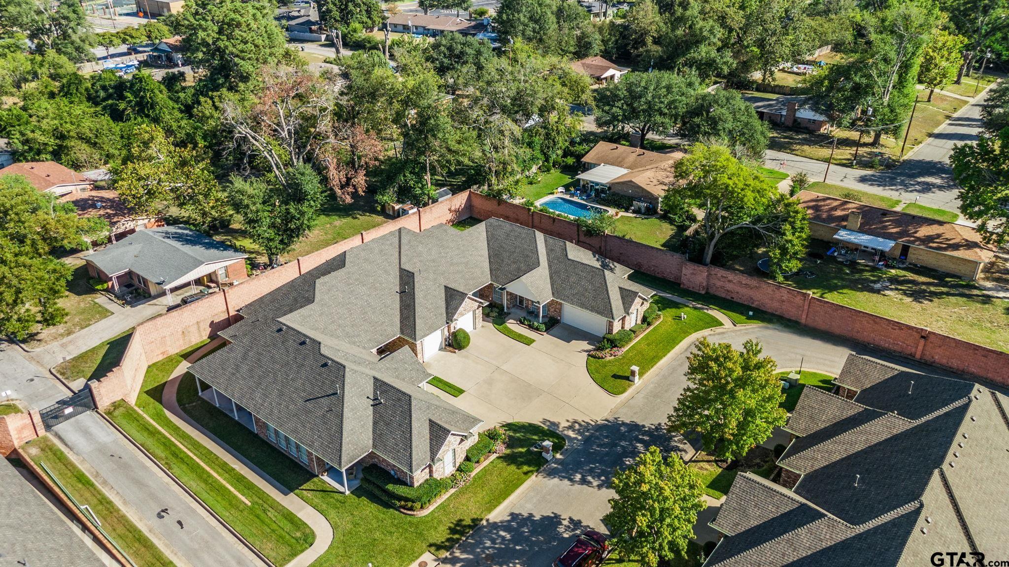 2438 Dietz Lane Tyler, TX 75701 - Photo 26 of 26 an aerial view of a house with a garden and plants