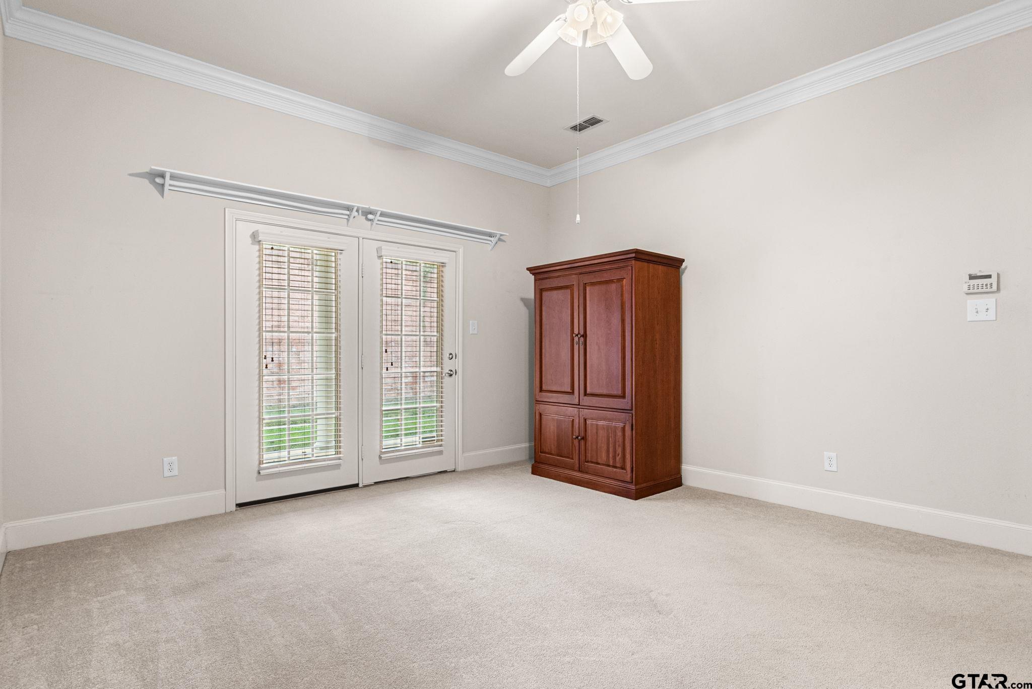 2438 Dietz Lane Tyler, TX 75701 - Photo 9 of 26 an empty room with windows and closet