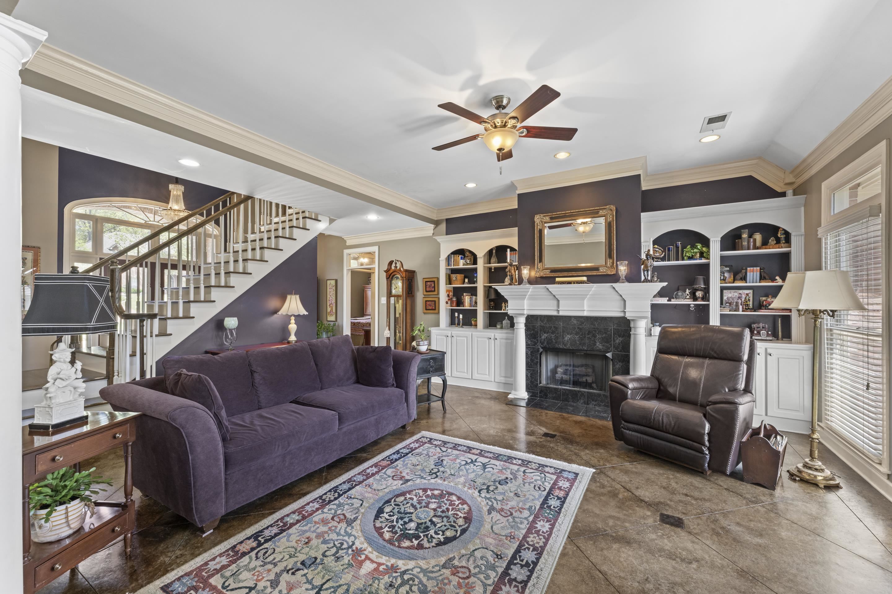 4132 Blackheath Drive Bartlett, TN 38135 - Photo 14 of 40 a living room with fireplace furniture and a rug