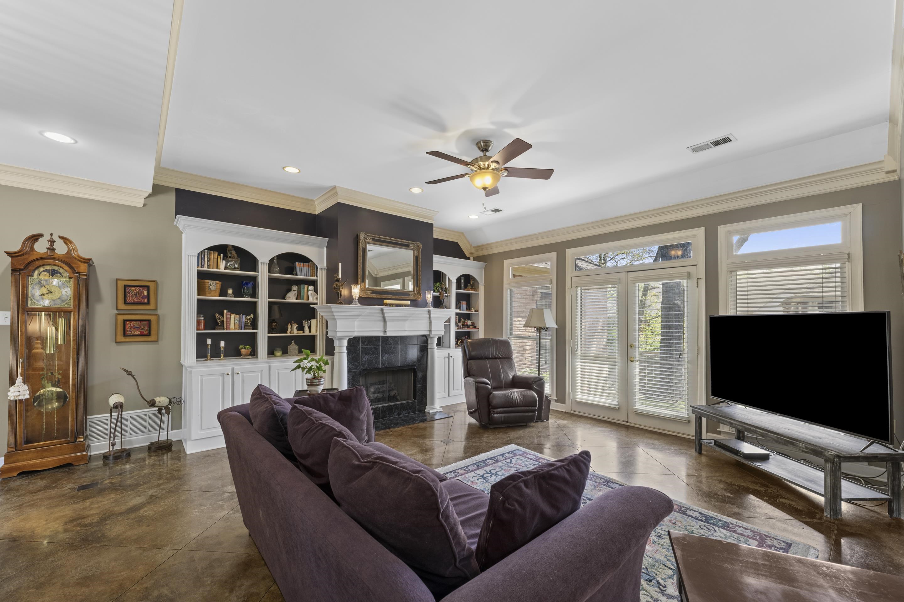 4132 Blackheath Drive Bartlett, TN 38135 - Photo 16 of 40 a living room with furniture flat screen tv and a fireplace