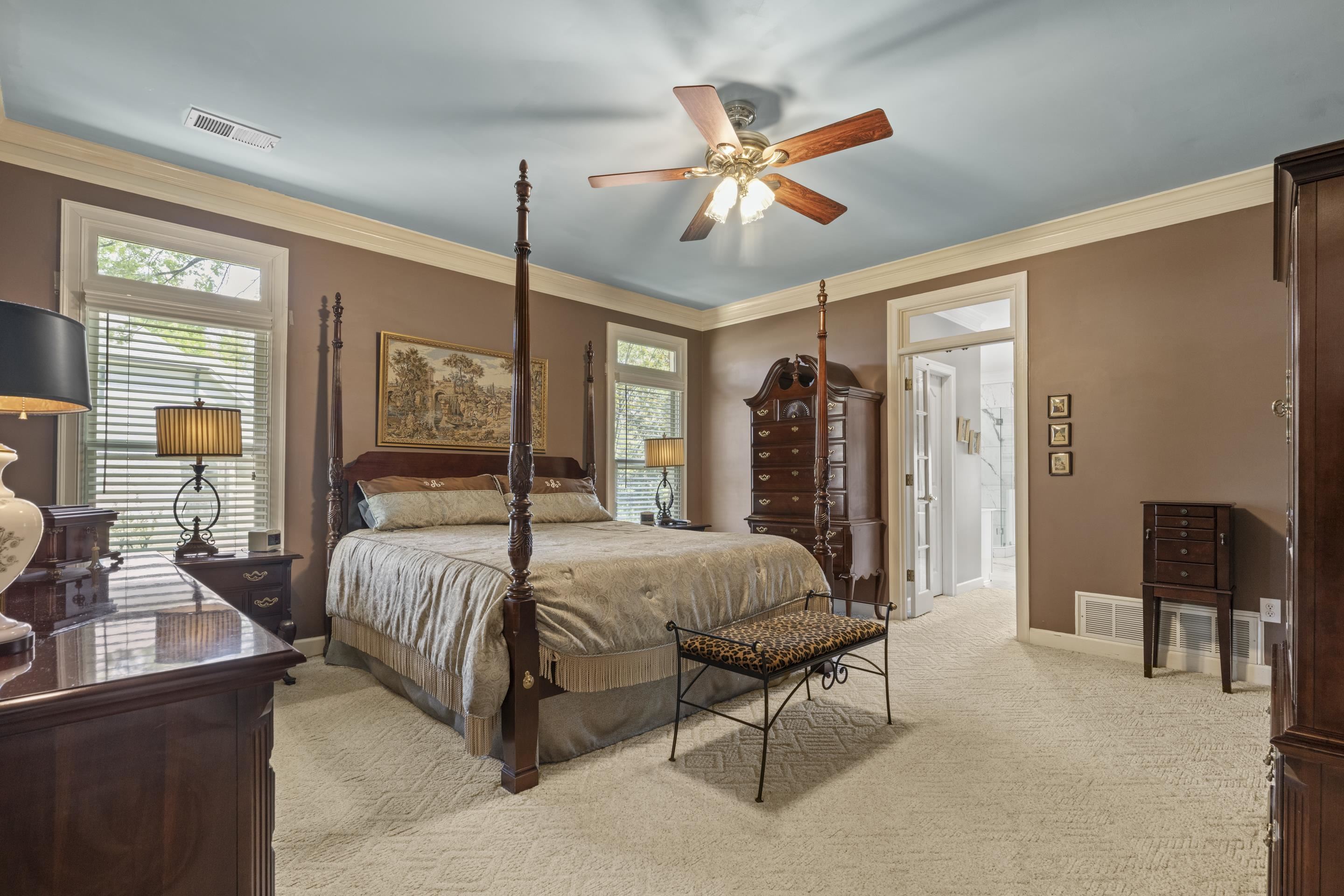 4132 Blackheath Drive Bartlett, TN 38135 - Photo 17 of 40 a bedroom with a bed and a chandelier