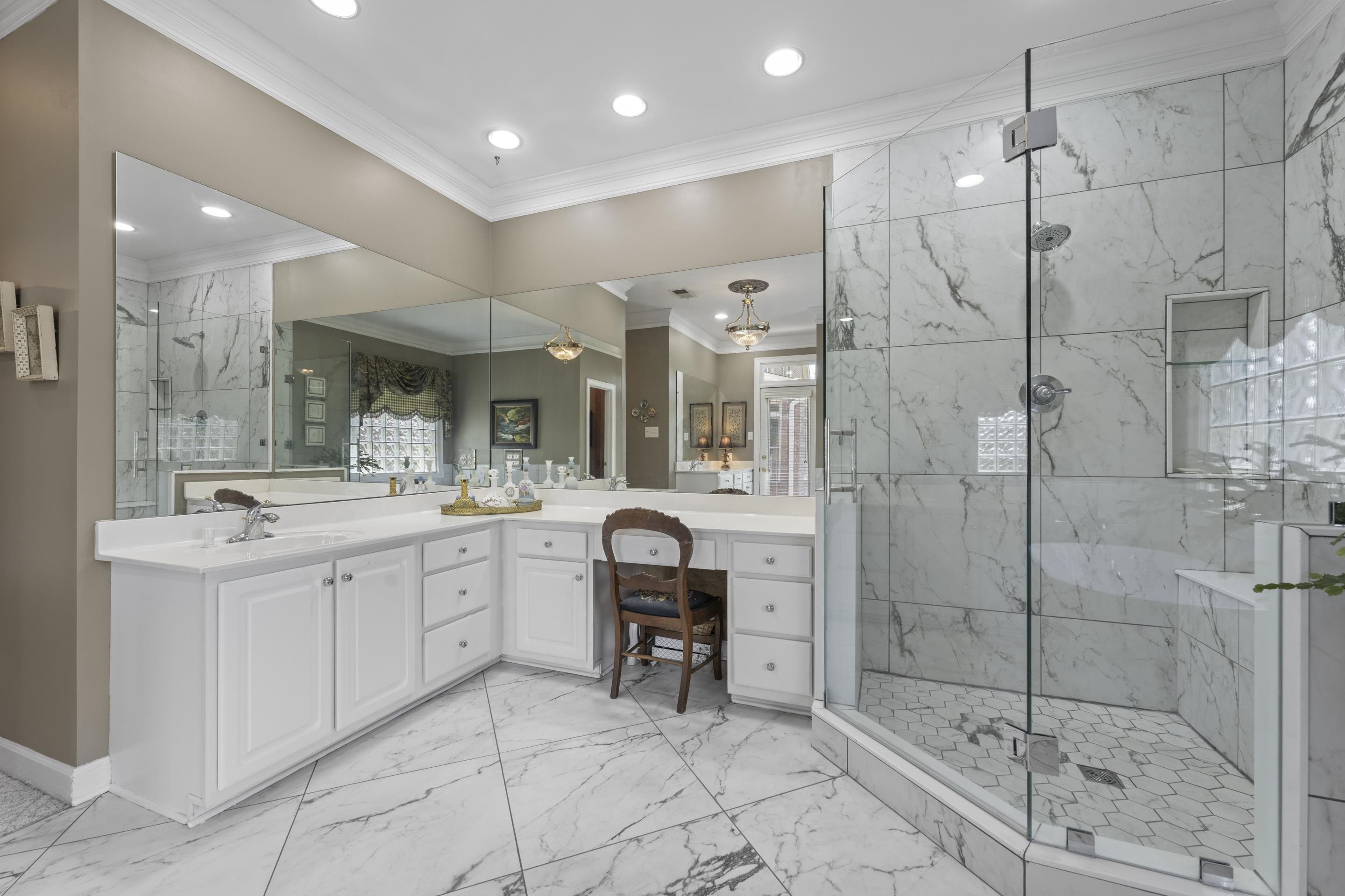 4132 Blackheath Drive Bartlett, TN 38135 - Photo 20 of 40 a bathroom with a sink a toilet and shower