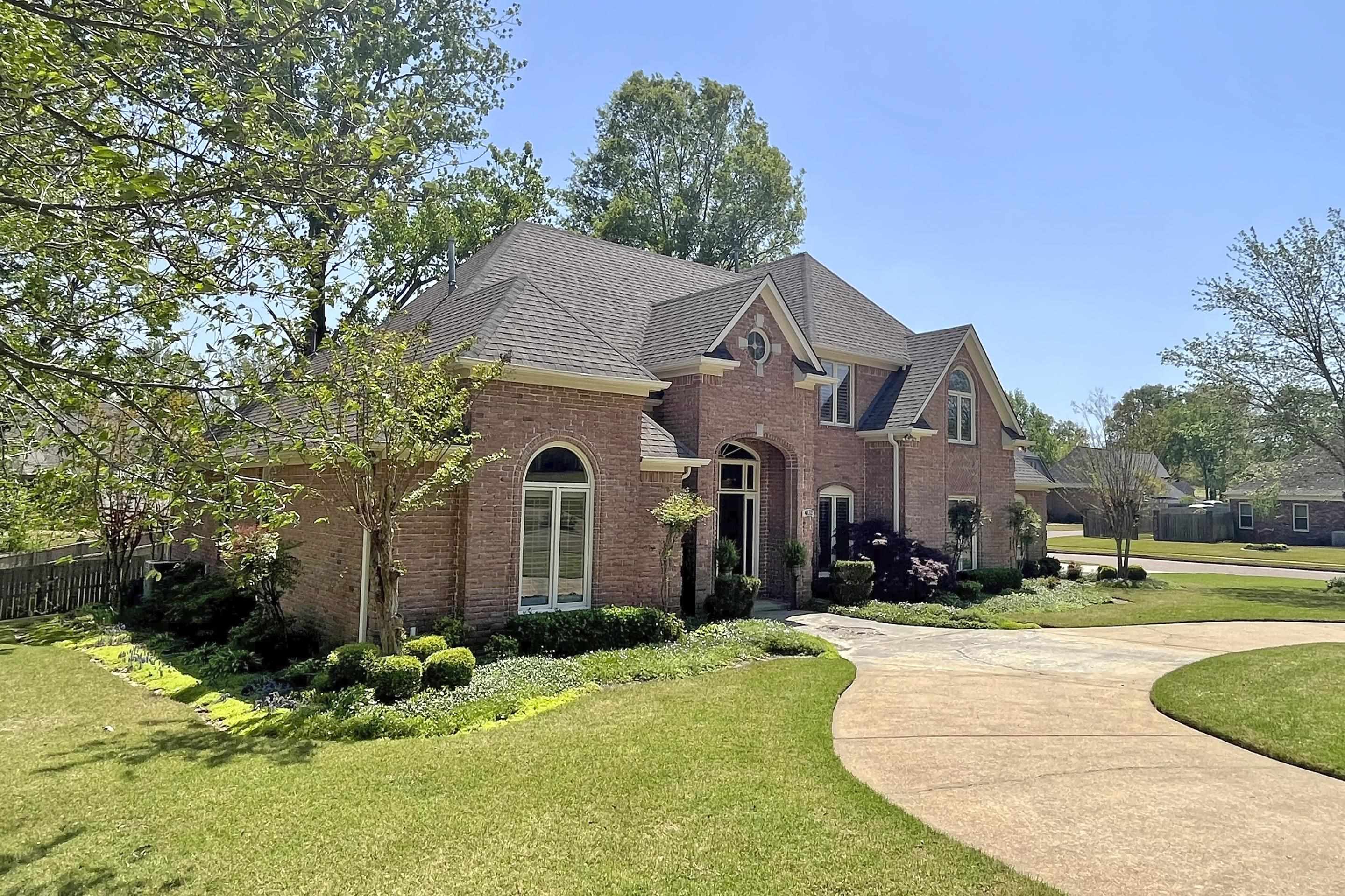 4132 Blackheath Drive Bartlett, TN 38135 - Photo 2 of 40 a front view of a house with a yard