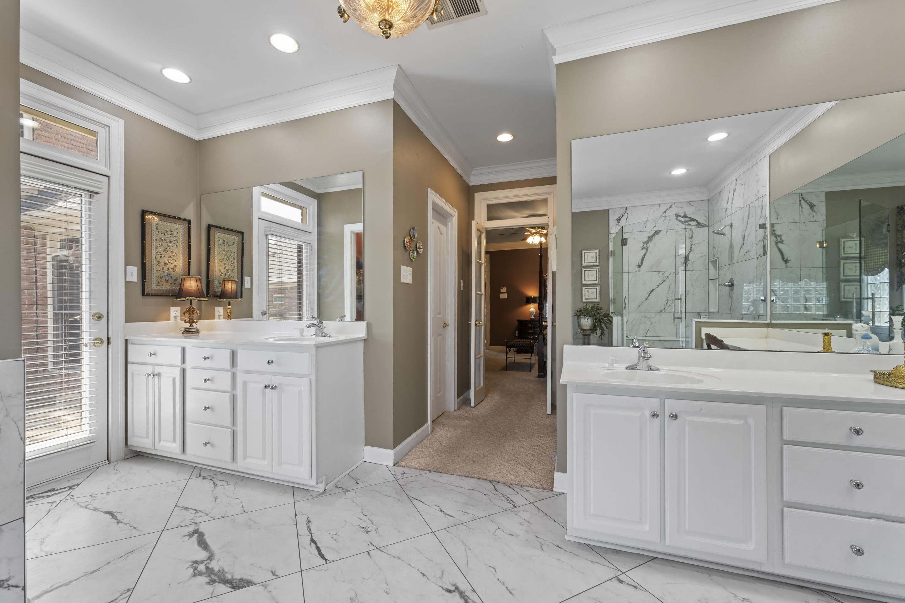 4132 Blackheath Drive Bartlett, TN 38135 - Photo 22 of 40 a spacious bathroom with a granite countertop sink mirror and cabinets