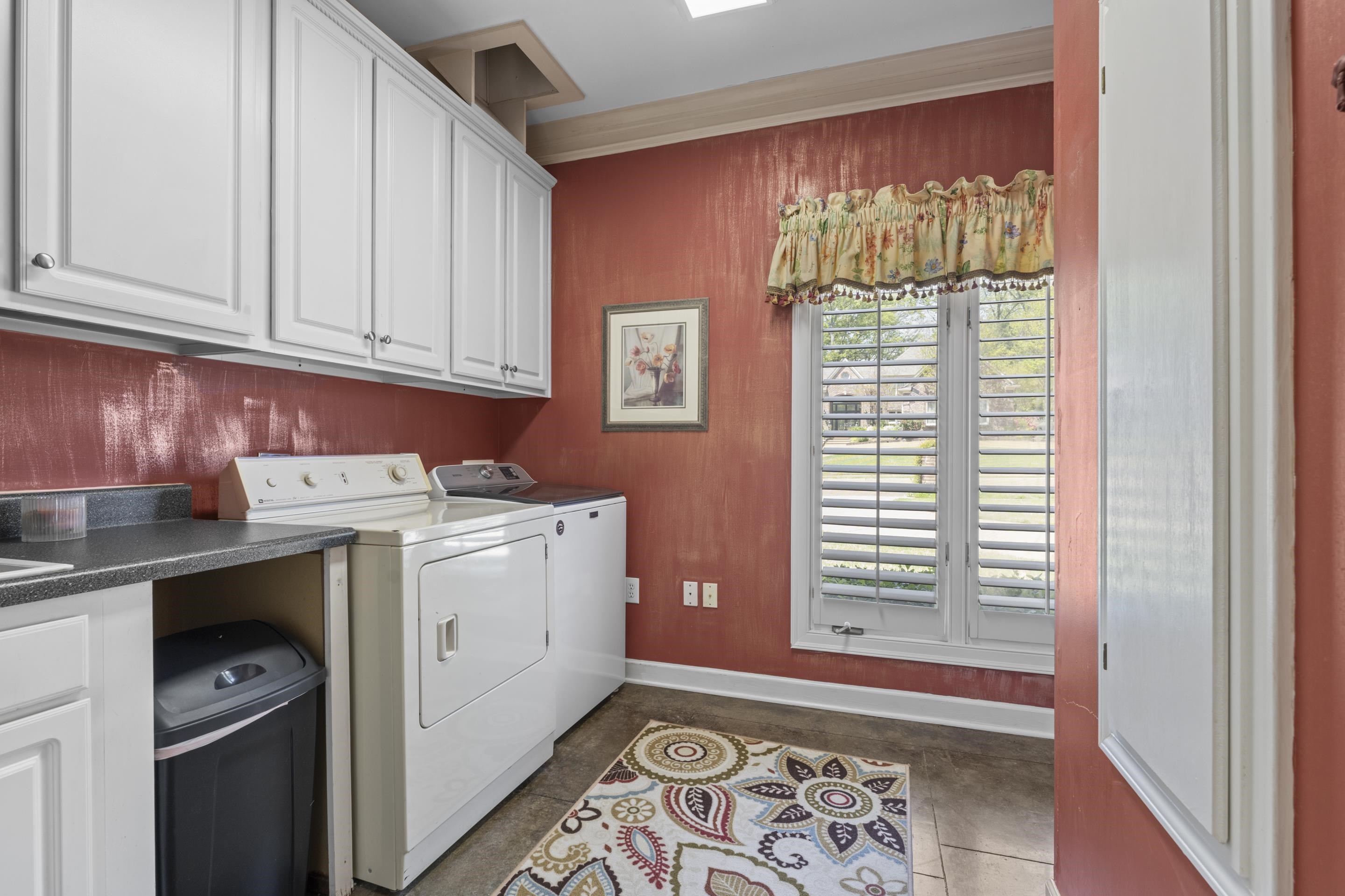 4132 Blackheath Drive Bartlett, TN 38135 - Photo 30 of 40 a view of a kitchen with fridge and wooden floor