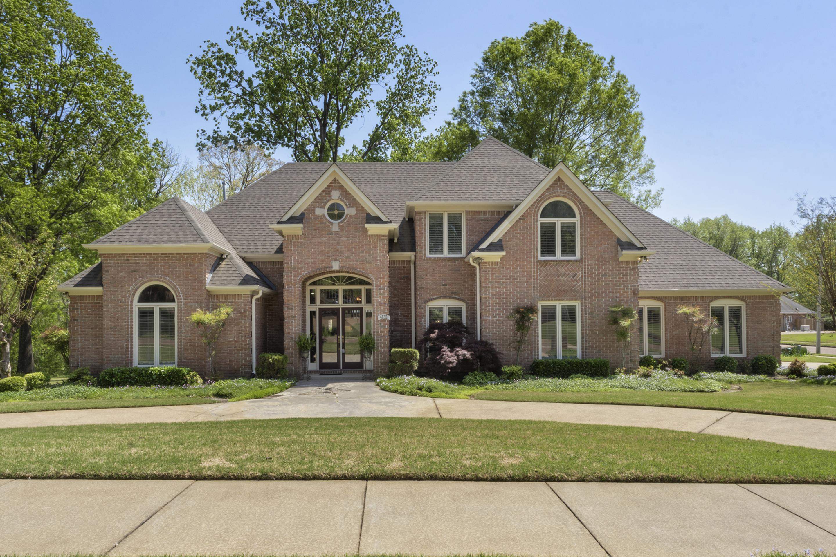 4132 Blackheath Drive Bartlett, TN 38135 - Photo 3 of 40 a front view of a house with a yard