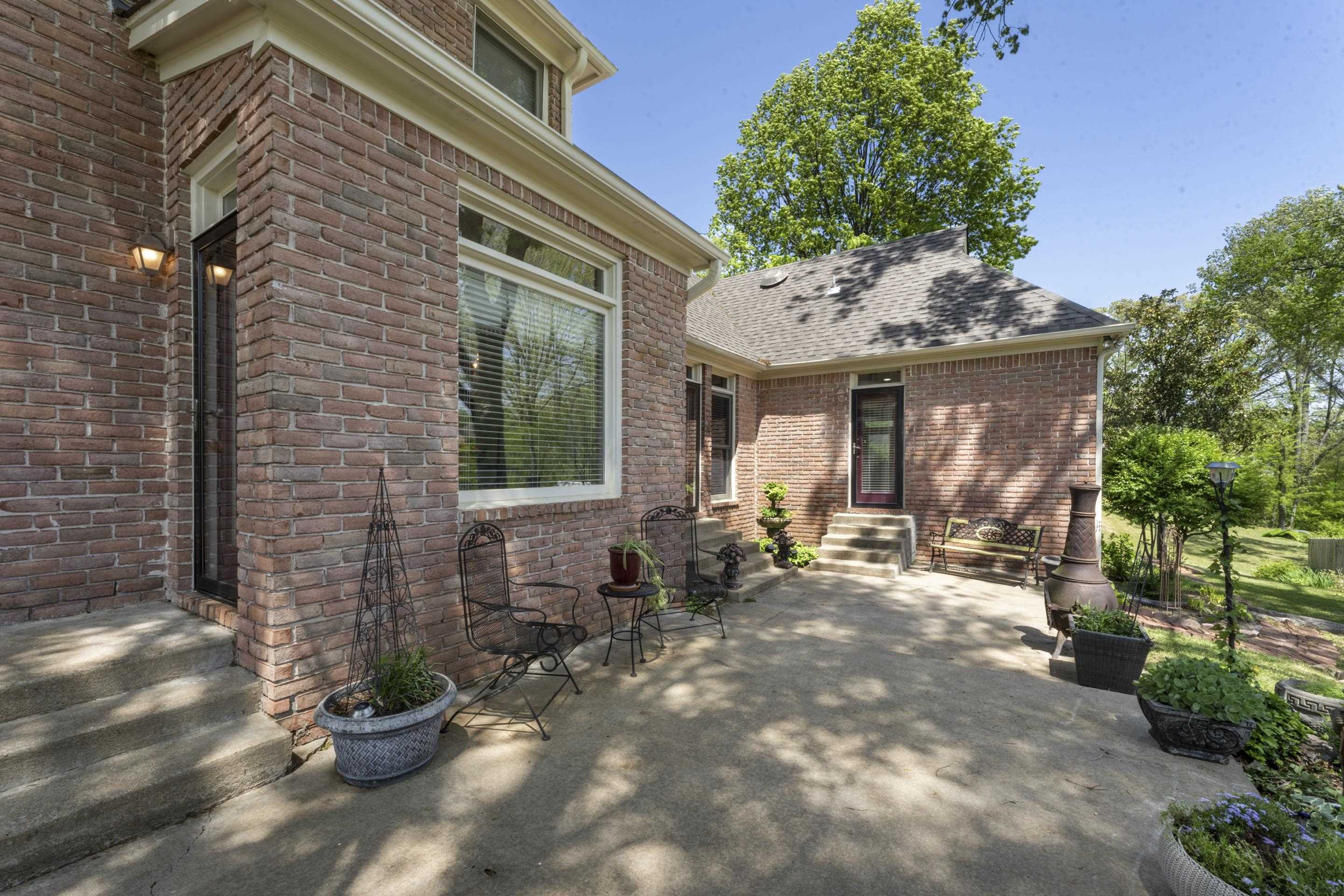 4132 Blackheath Drive Bartlett, TN 38135 - Photo 31 of 40 a view of a house with a yard patio and sitting area