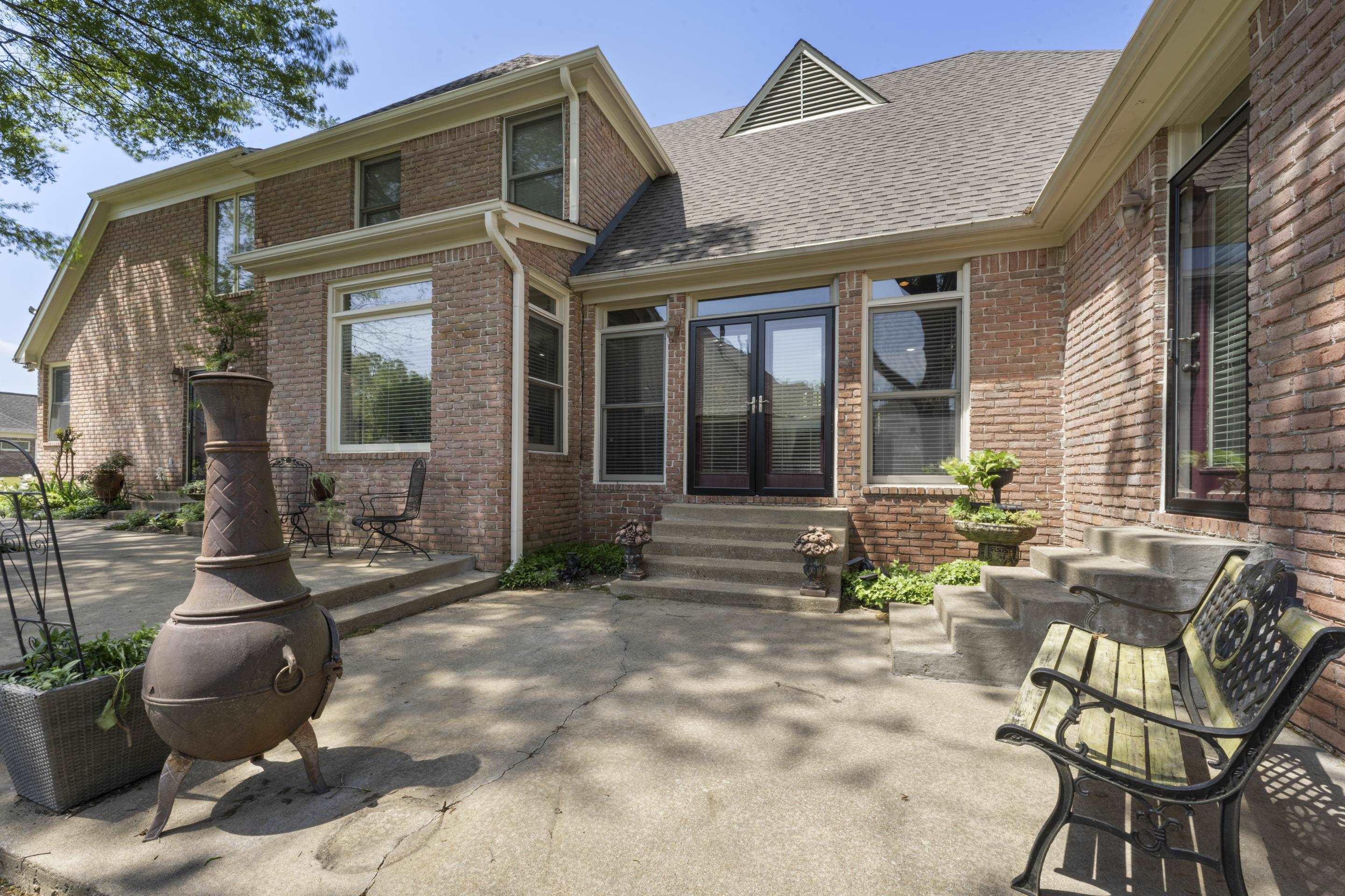 4132 Blackheath Drive Bartlett, TN 38135 - Photo 32 of 40 a view of a patio with couches table and chairs and potted plants