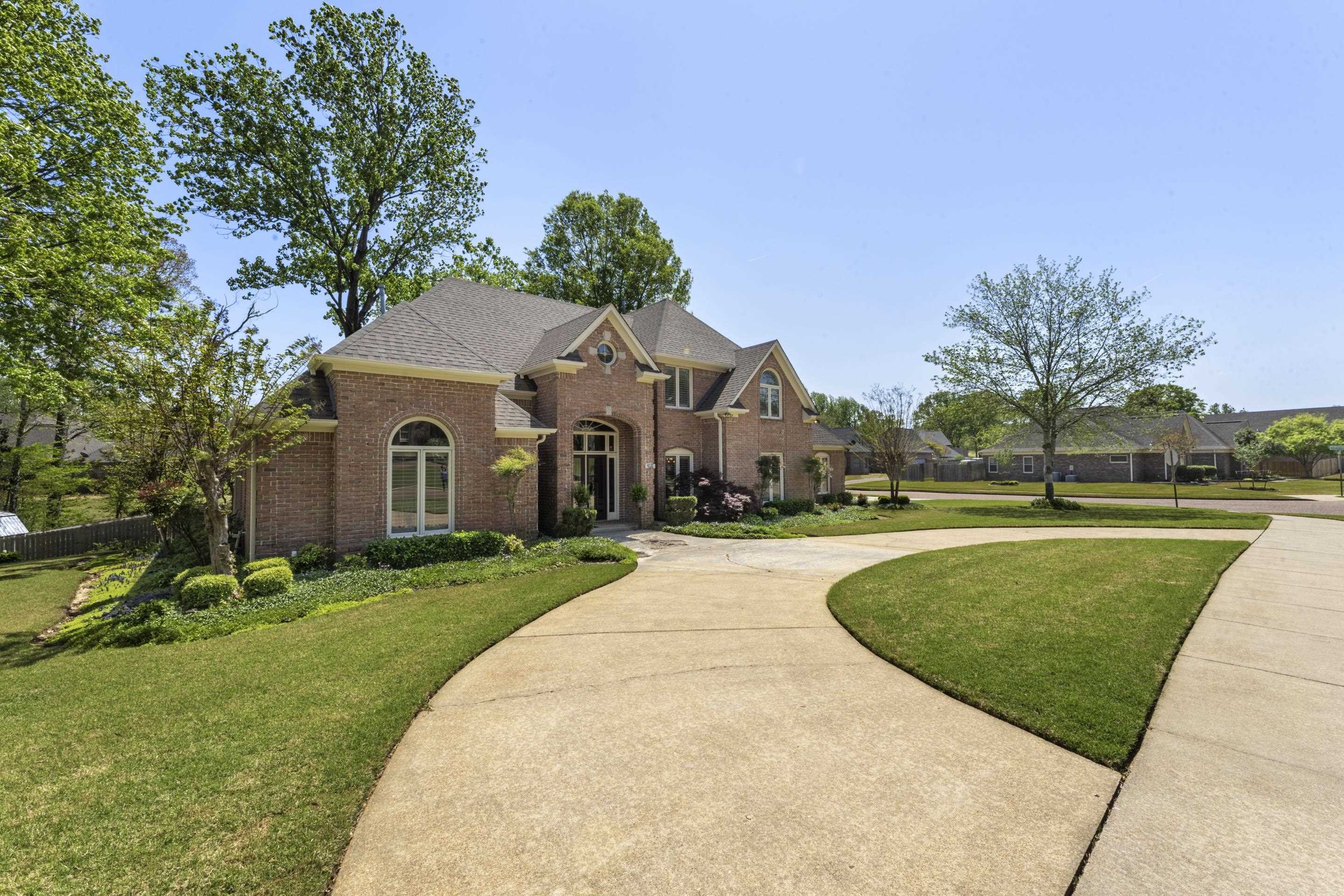 4132 Blackheath Drive Bartlett, TN 38135 - Photo 37 of 40 a front view of a house with a yard