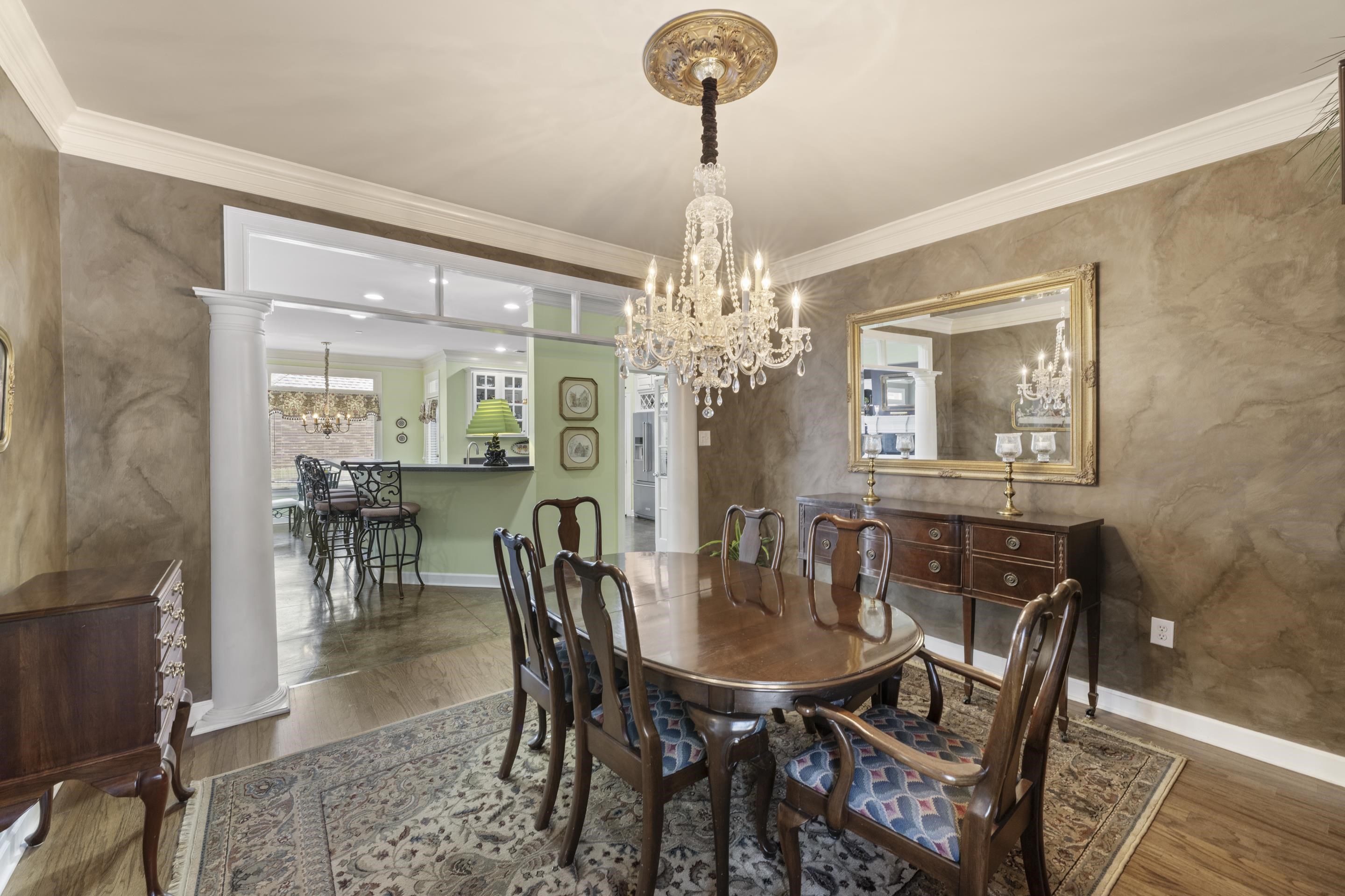 4132 Blackheath Drive Bartlett, TN 38135 - Photo 7 of 40 a view of a dining room with furniture and chandelier
