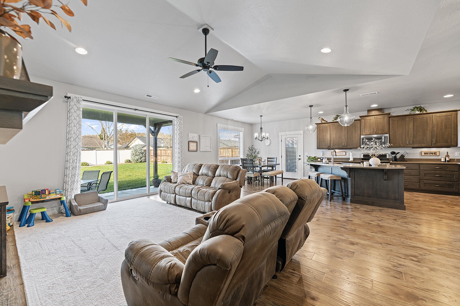 1043 Arrowhead Trail Eagle Point, OR 97524 - Photo 12 of 29 a living room with furniture kitchen and a large window