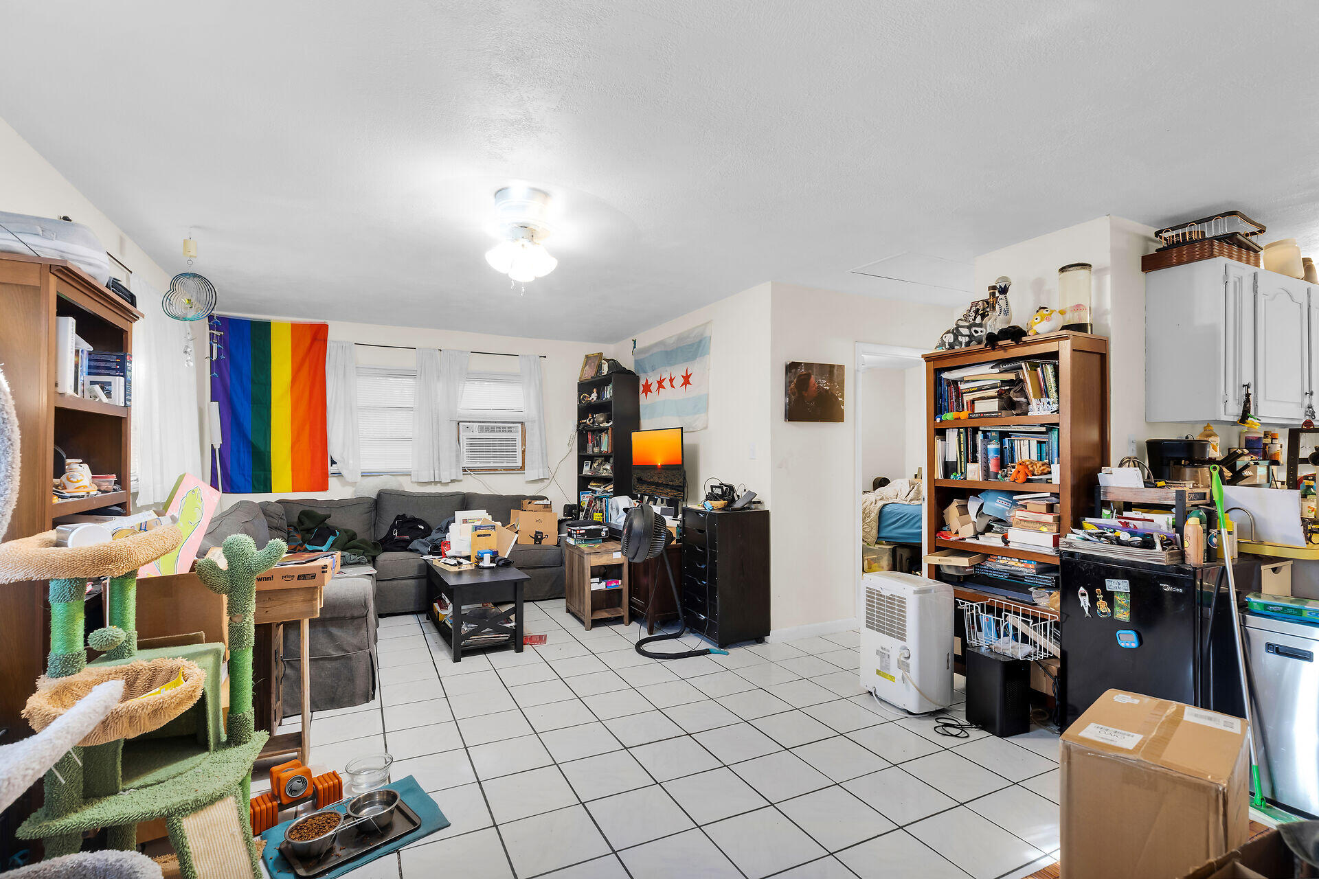 14 Miami Drive Key Largo, FL 33037 - Photo 5 of 16 a living room with furniture and a flat screen tv