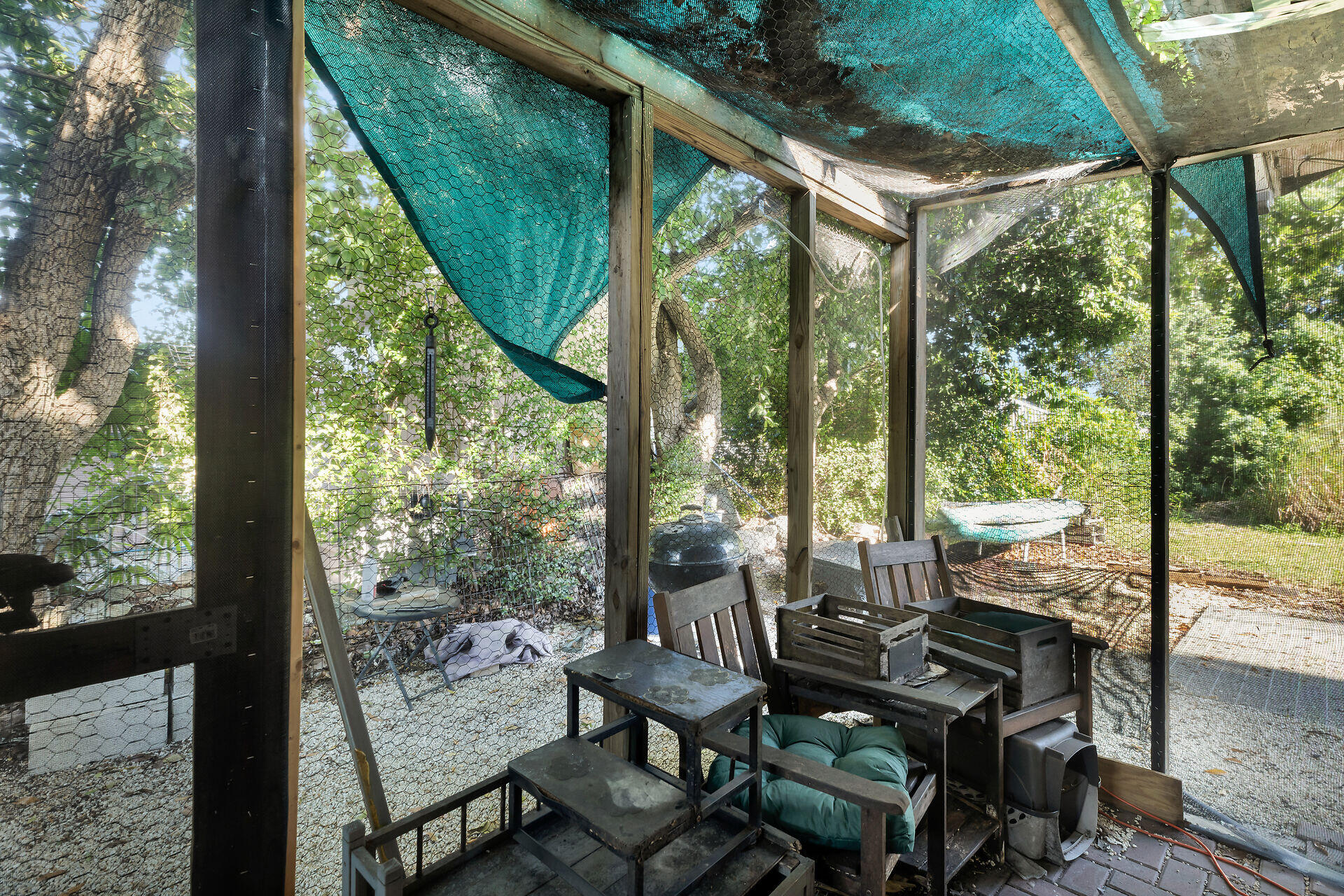 14 Miami Drive Key Largo, FL 33037 - Photo 10 of 16 a view of a porch with chairs and backyard
