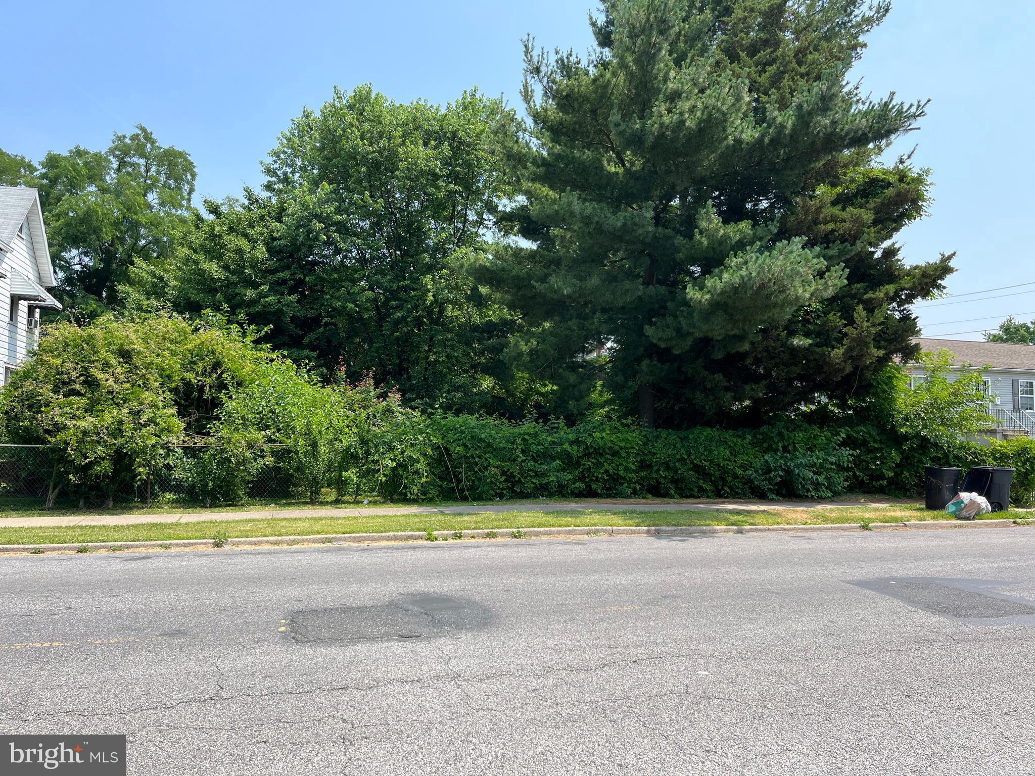 2513 South 76th Street Philadelphia, PA 19153 - Photo 3 of 3 a view of a swimming pool and a yard