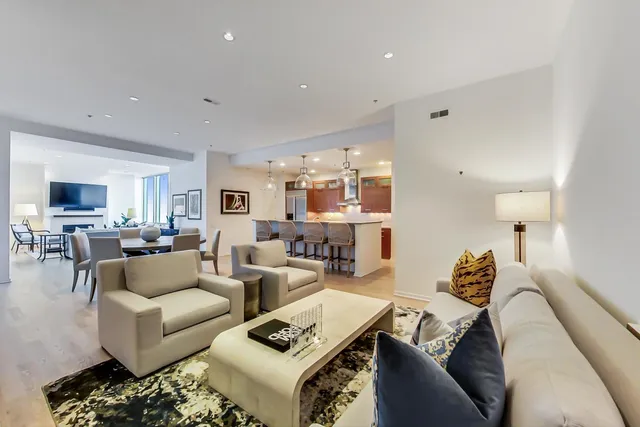 a view of a living room and bathroom
