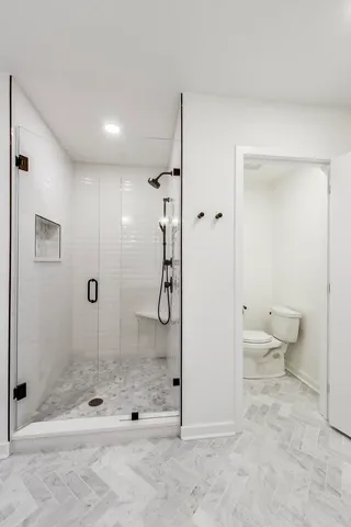 a bathroom with a double vanity sink and mirror