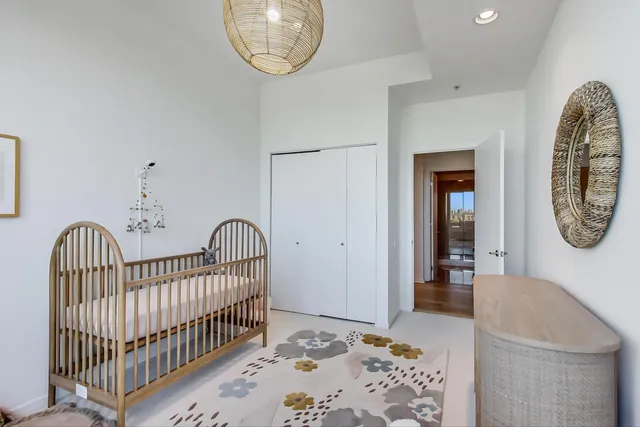 a room with furniture and a book shelf