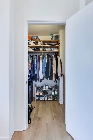 a lobby with furniture and floor to ceiling window