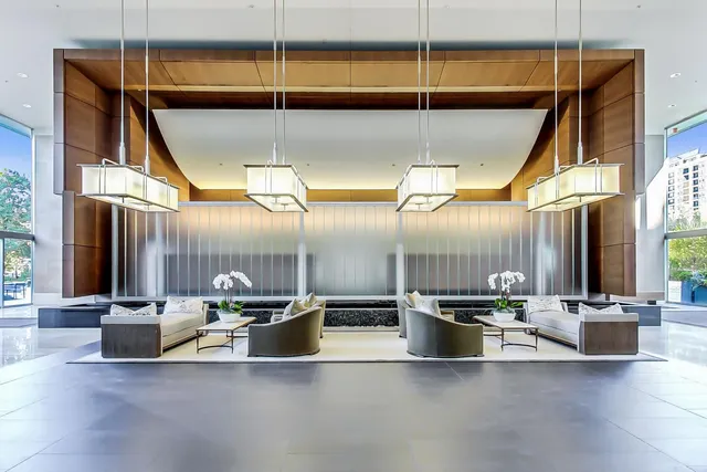 a view of a patio with chairs and a table