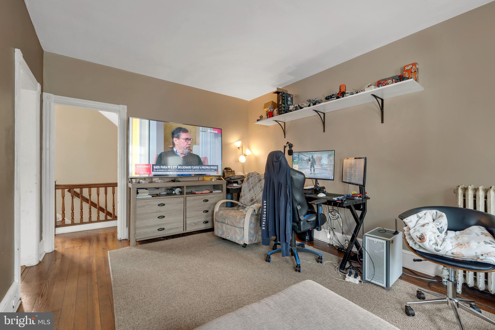 121 Bridgeboro Street Riverside, NJ 08075 - Photo 18 of 34 a room with furniture and musical instruments