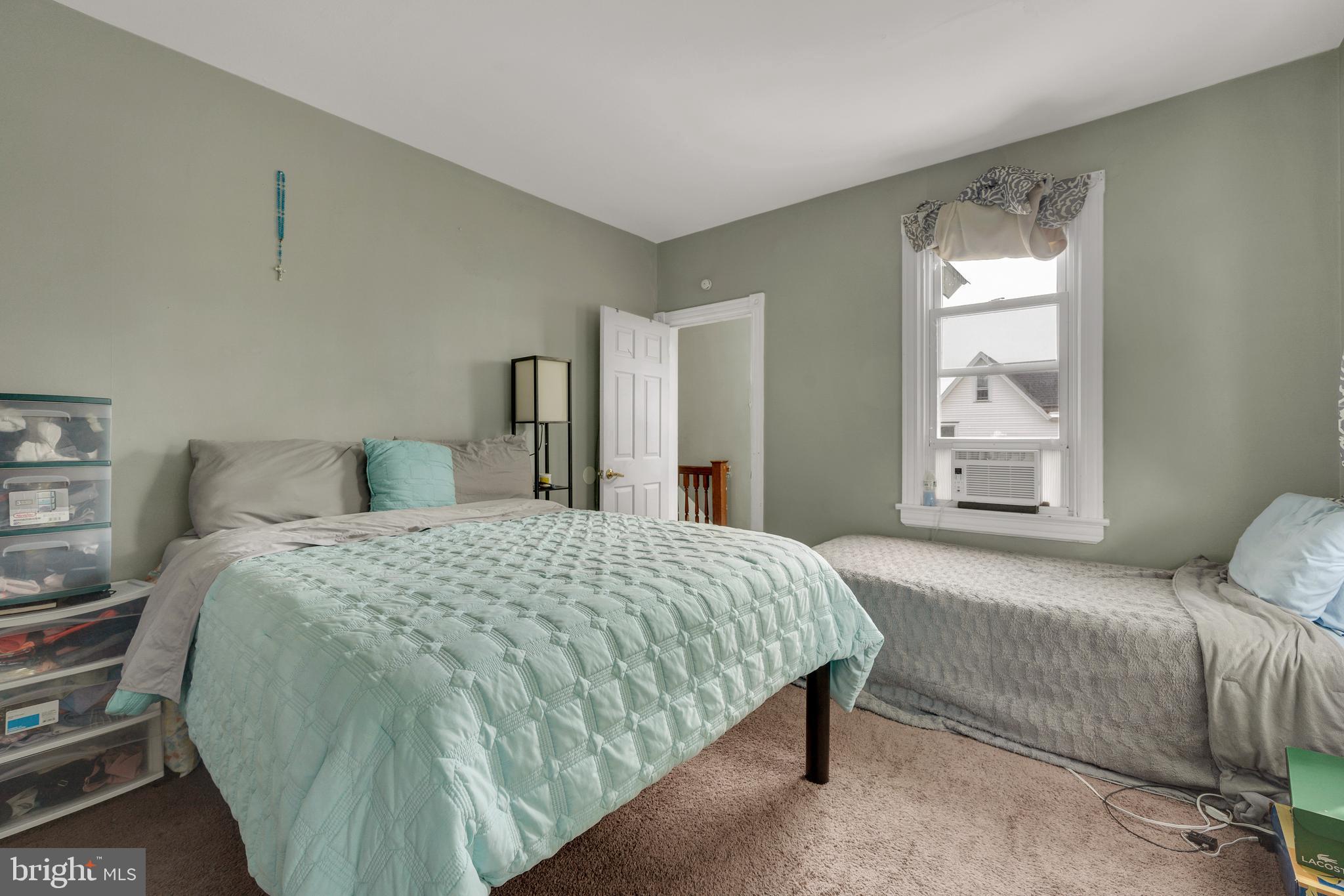 121 Bridgeboro Street Riverside, NJ 08075 - Photo 21 of 34 a bedroom with a bed and window