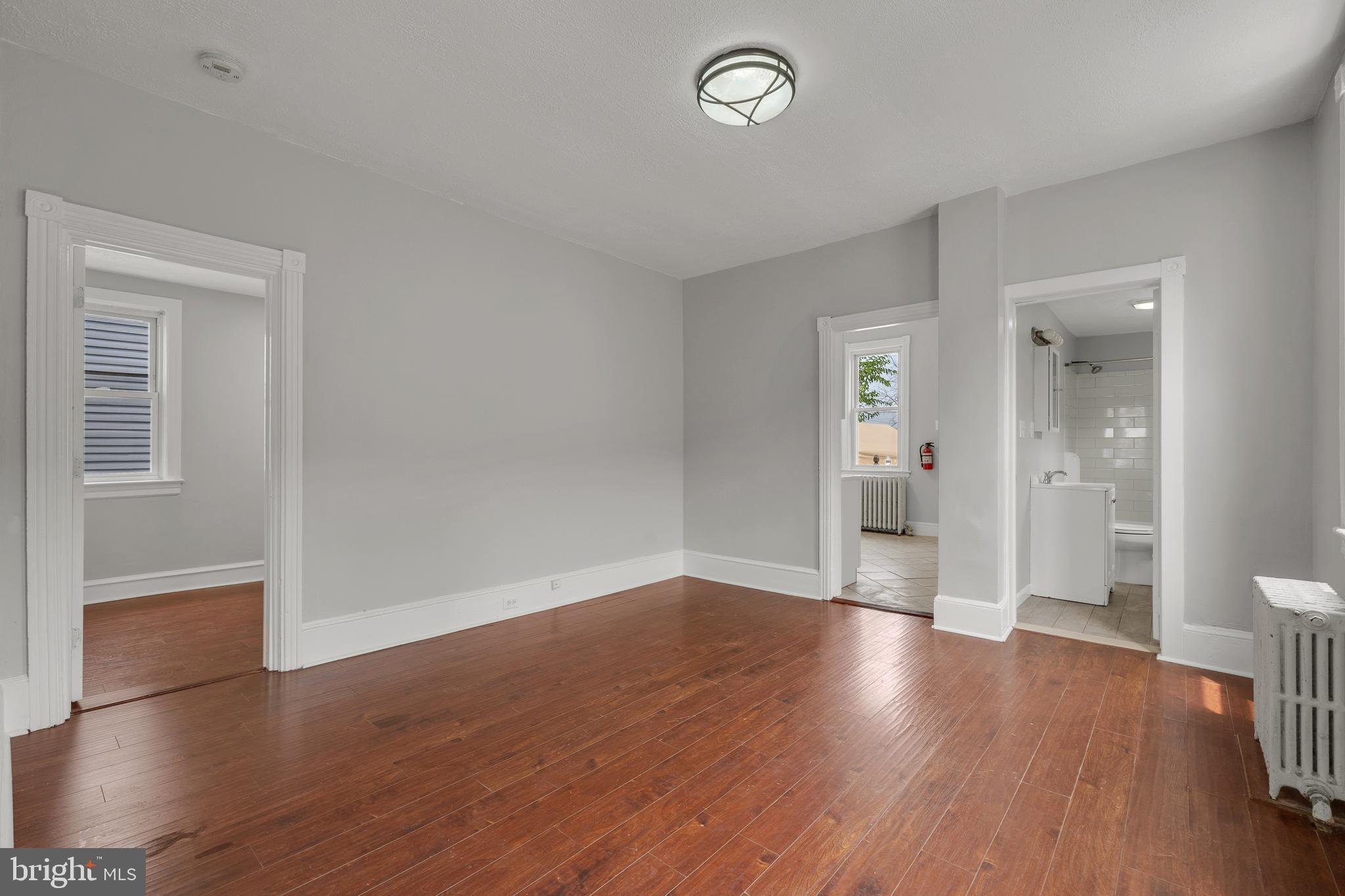 121 Bridgeboro Street Riverside, NJ 08075 - Photo 9 of 34 wooden floor in an empty room
