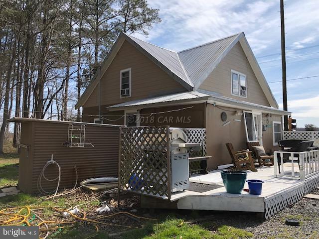 7713 Libertytown Road Berlin, MD 21811 - Photo 2 of 14 a house view with a outdoor space