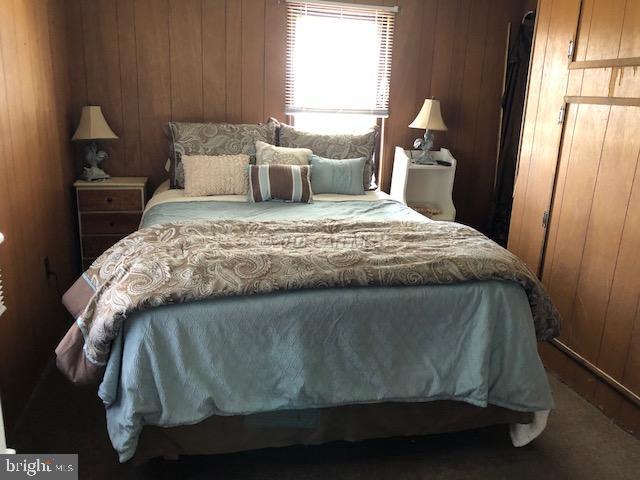 7713 Libertytown Road Berlin, MD 21811 - Photo 3 of 14 a bedroom with a bed and a window