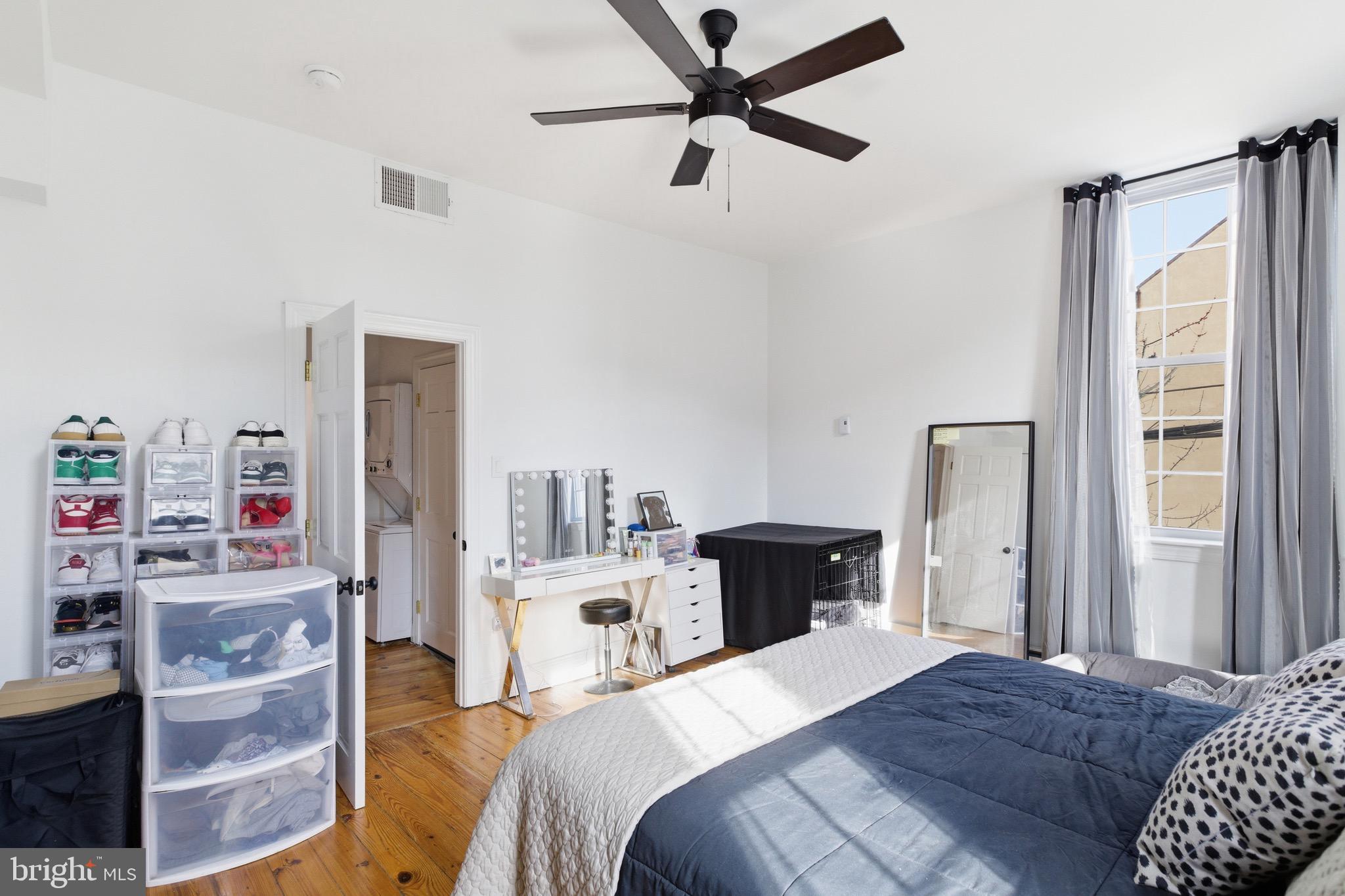 700 South 2nd Street, Unit B1 Philadelphia, PA 19147 - Photo 14 of 18 a bedroom with a bed dresser and a window