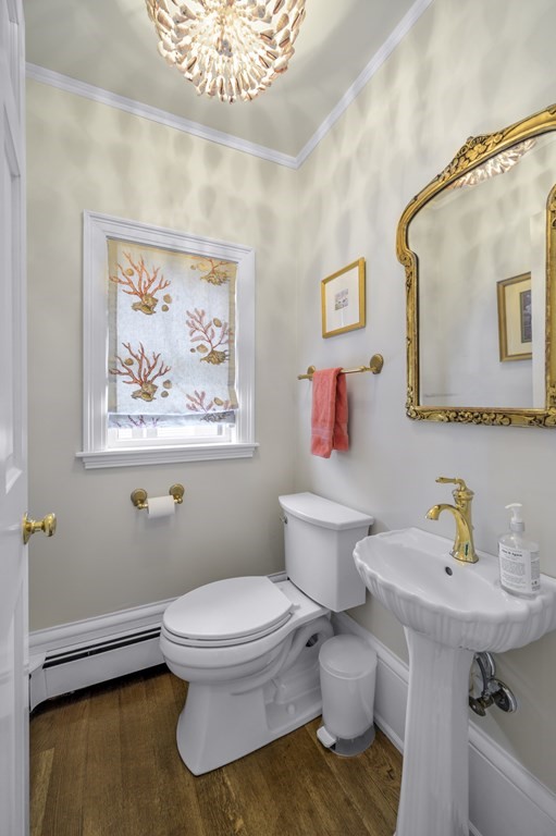 346 Ocean Avenue Marblehead, MA 01945 - Photo 15 of 42 a bathroom with a toilet sink and mirror