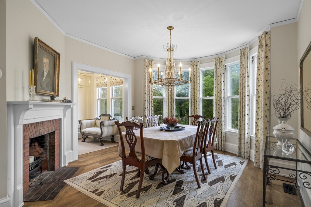 346 Ocean Avenue Marblehead, MA 01945 - Photo 17 of 42 a view of a dining room with furniture window and wooden floor