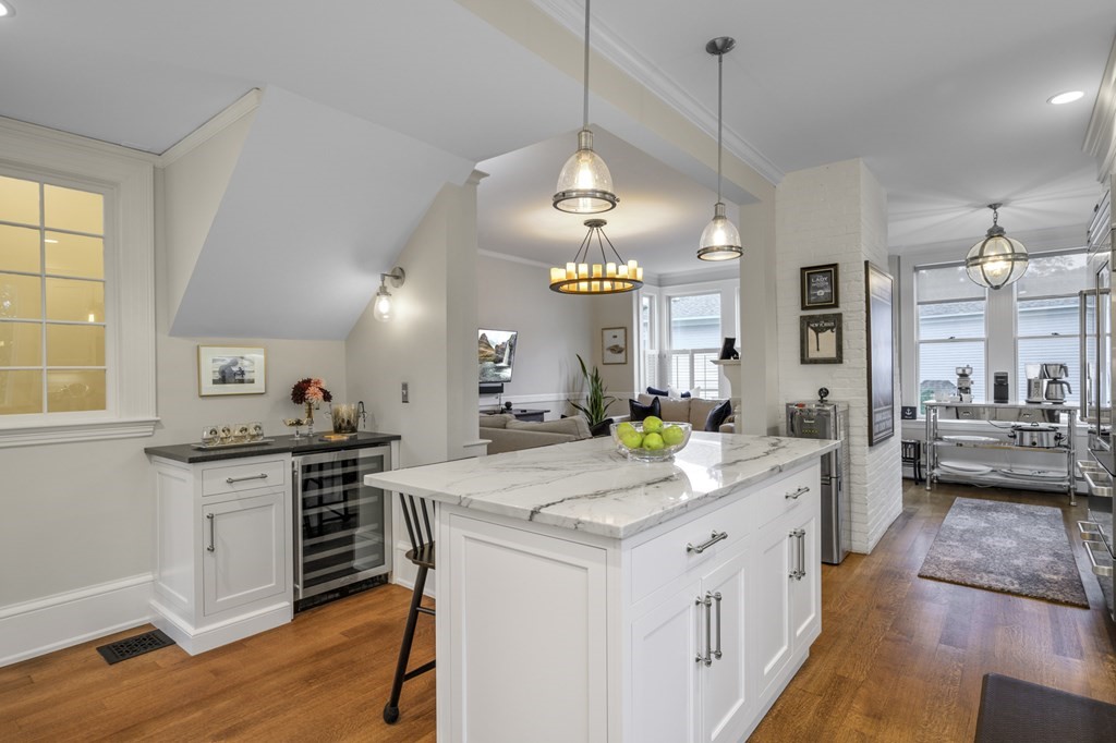 346 Ocean Avenue Marblehead, MA 01945 - Photo 23 of 42 a kitchen with a sink stove and wooden floor